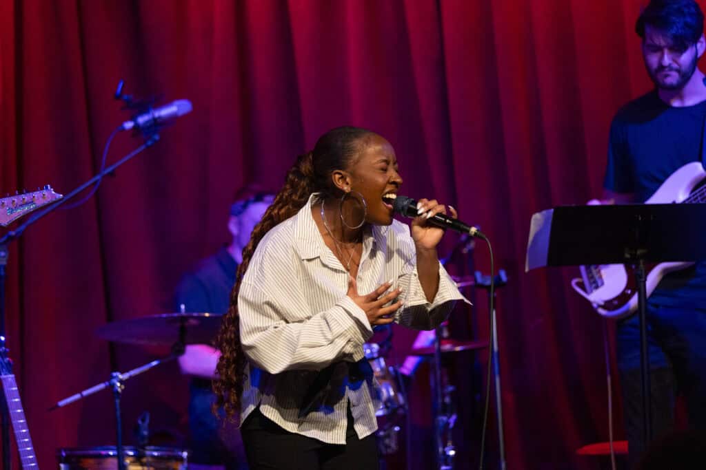 HVS Conservatory vocal students performing on stage in Los Angeles showcase
